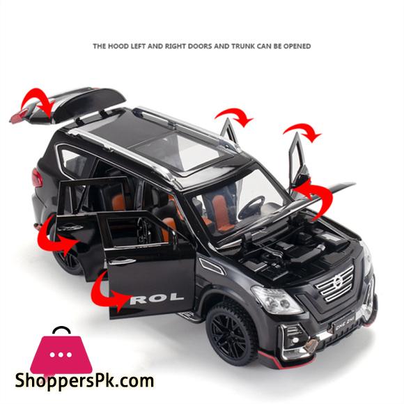 1:24 Nissan Patrol Alloy Car Model Diecasts Metal Toy Modified Off road Vehicles Model Simulation Sound Light Childrens Toy Gift